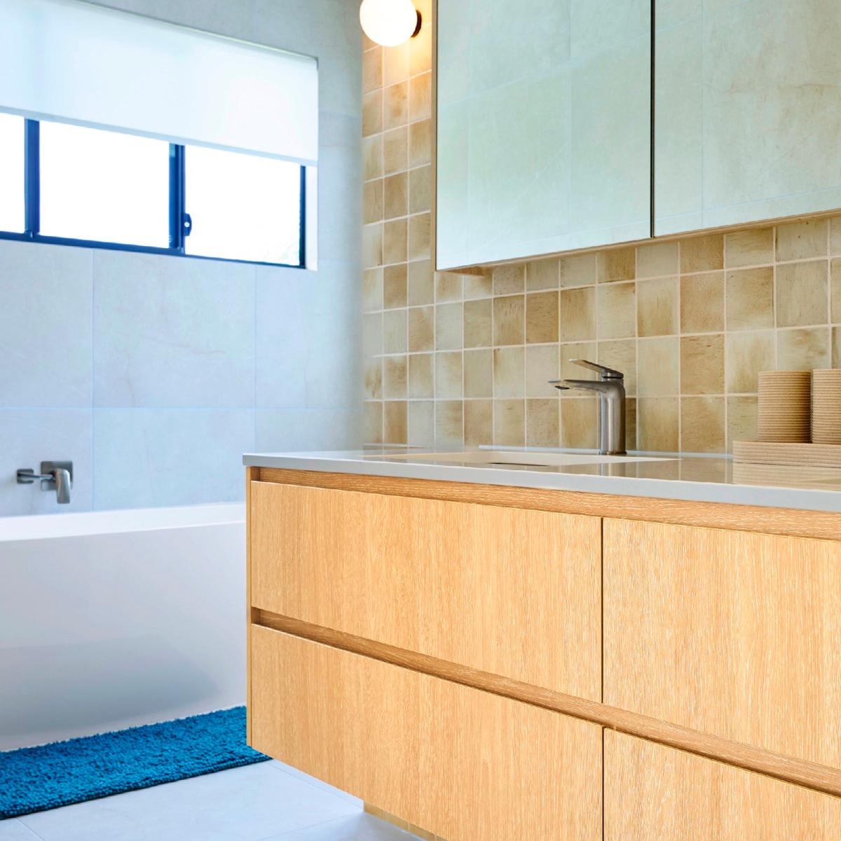 A bathroom vanity in EGR Decor surfaces