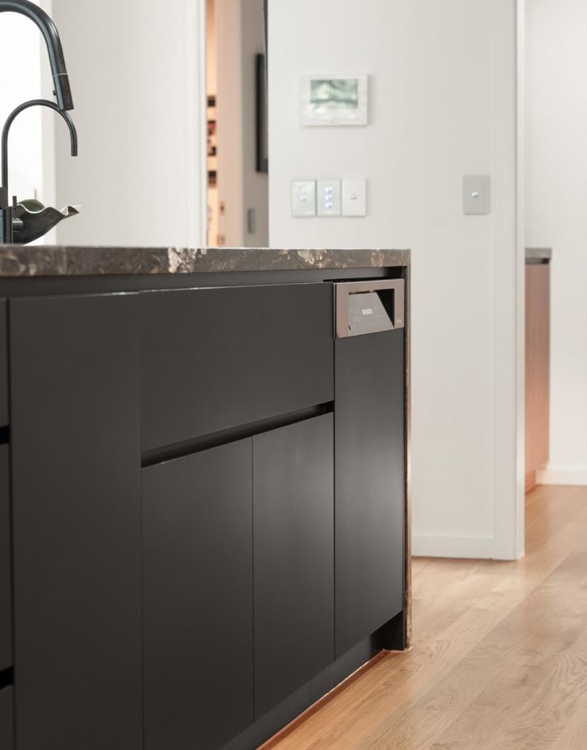 “Hardware was kept to a minimum throughout this project to maintain the streamlined design and keep the focus on the hero materials.”